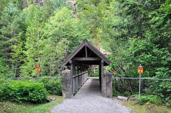 A very small covered bridge leading to Brandywine Falls