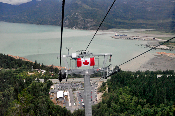 Canadian flag and looking down on the ride up