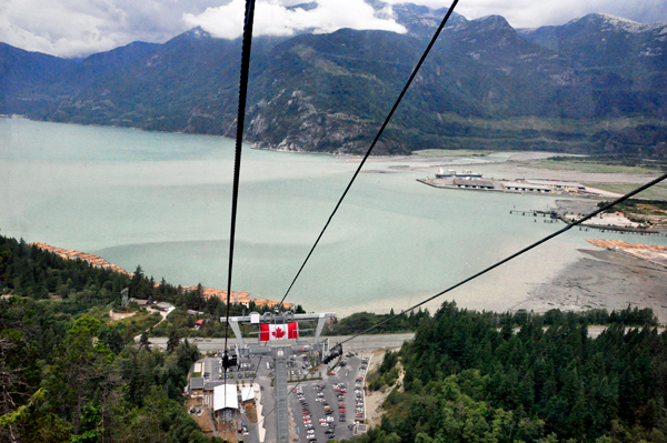 Canadian flag and looking down on the ride up