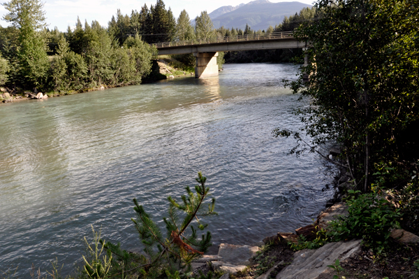 the bridge and river before the path