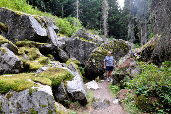 Lee Duquette and lichen covered rocks