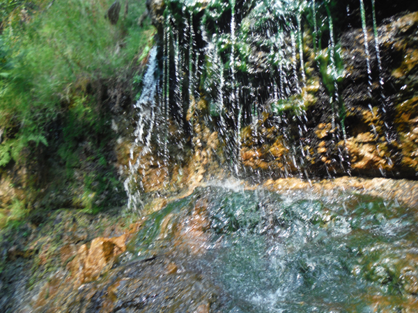 hot springs cascading down the cliffs