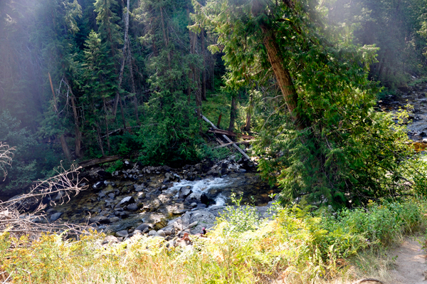 looking down the cliff at the hot springs