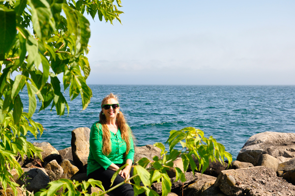 Karen Duquette relaxing by the wate