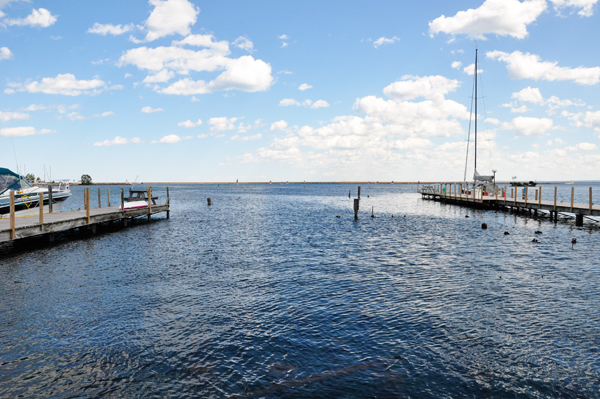 buoys in the water that also carry the USA Flag