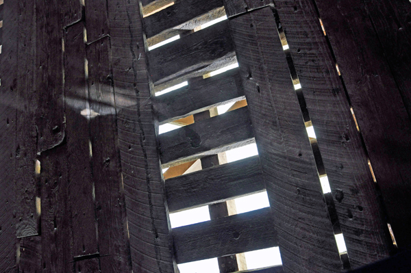 looking down through the floor of the covered bridge