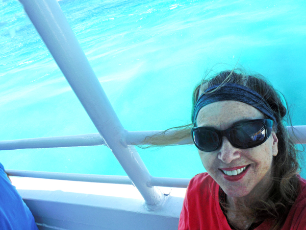 Karen Duquette on the tender, ready to go ashore.