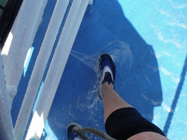 rinsing sand off of the feet