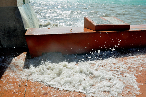 waves crashing through the wall