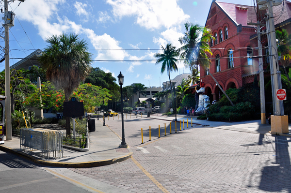 statue and a street