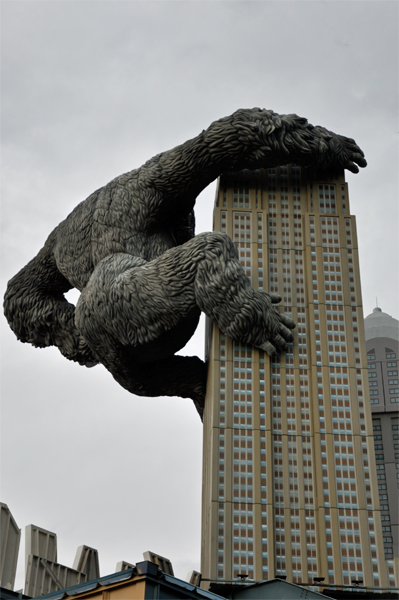 King Kong holding an airplane