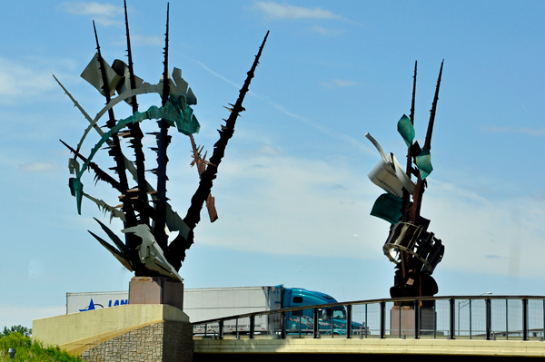 Odyssey sculpture on bridge in Iowa