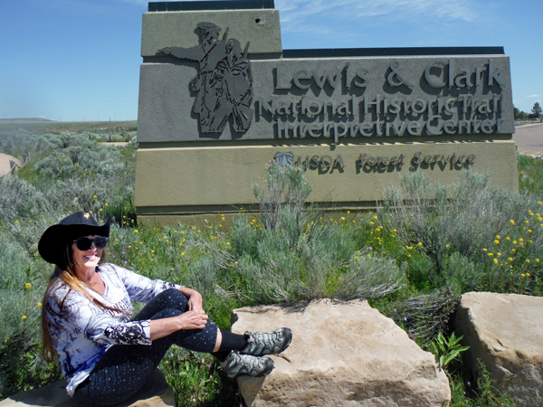 Karen Duquette at the Lewis & Clark sign