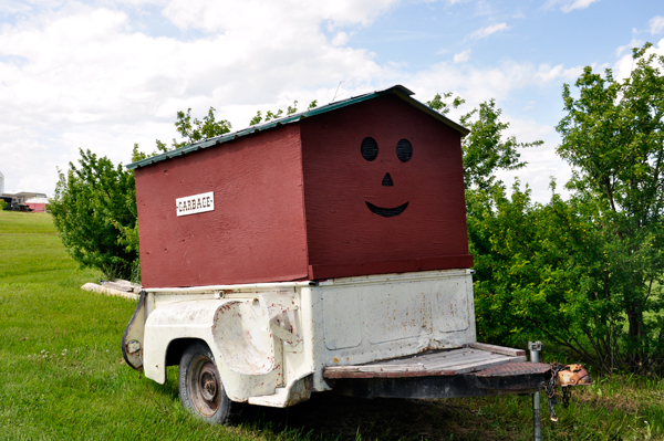 smiling garbage bin