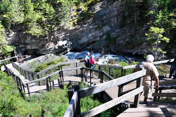 Lee Duquette going down the stairs to the falls