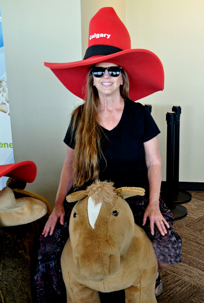 Karen Duquette on a pony inside the Calgary Tower