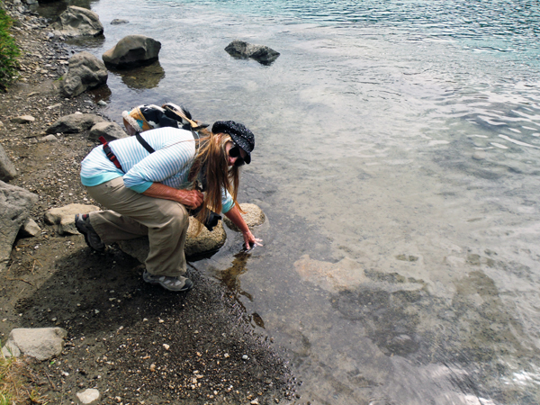 Karen Duquette feeling the temp of The Yukon River