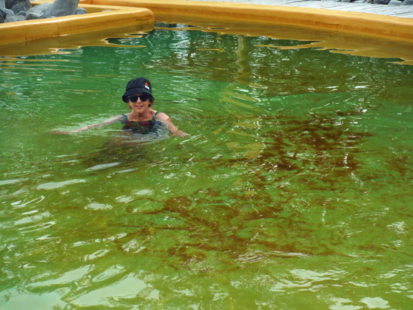 Karen on the hot side of Takhini Hot Springs.