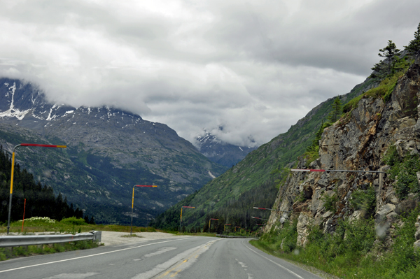 The summit of the White Pass and snow poles