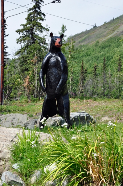 bear statue outside of the logge and lounge