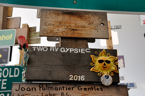 destroyed Sign Post Forest sign