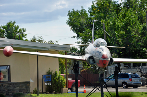 airplane on a post