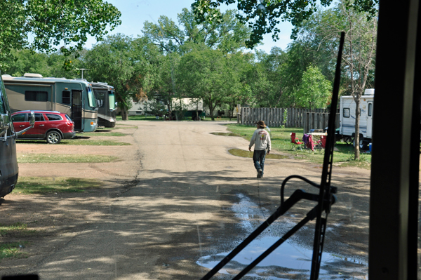 water hole in road at campground