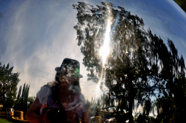 Karen Duquette's reflection in the big silver ball