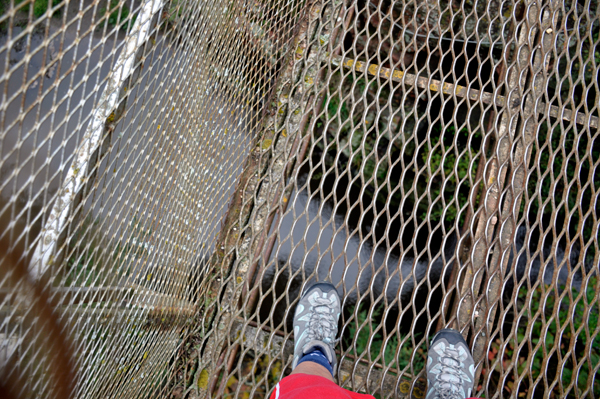 looking down through the iron footbridge