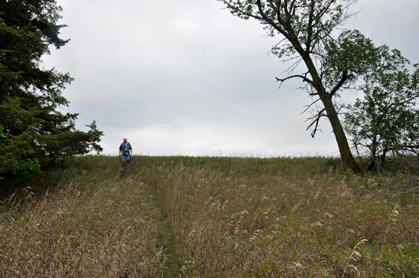 Lee Duquette on a hill at Devils Gulch