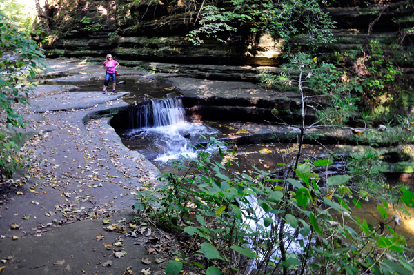 Karen Duquette at the top of the waterfall