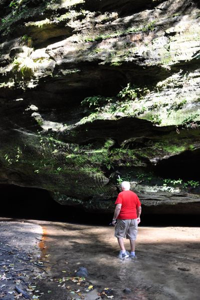 Lee Duquette investigating a cliff ledge