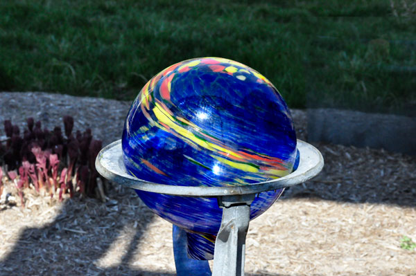 spinning globe in a yard