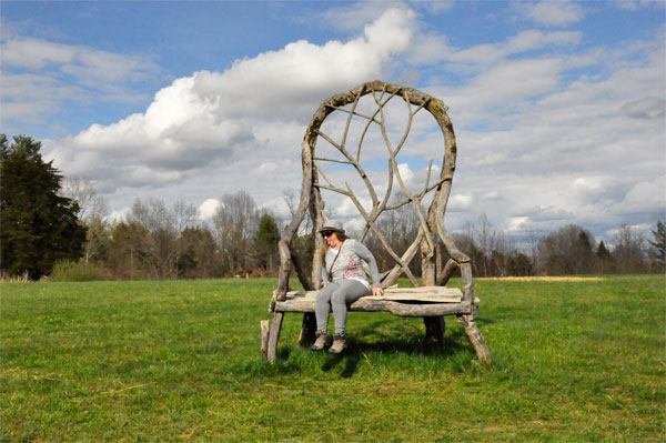 Karen Duquette tries to get up onto a big chair