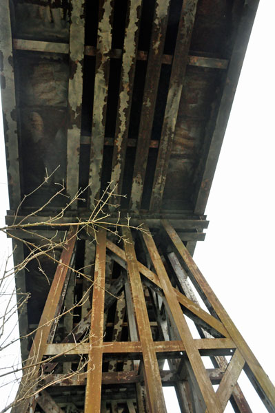 under the railroad trestle