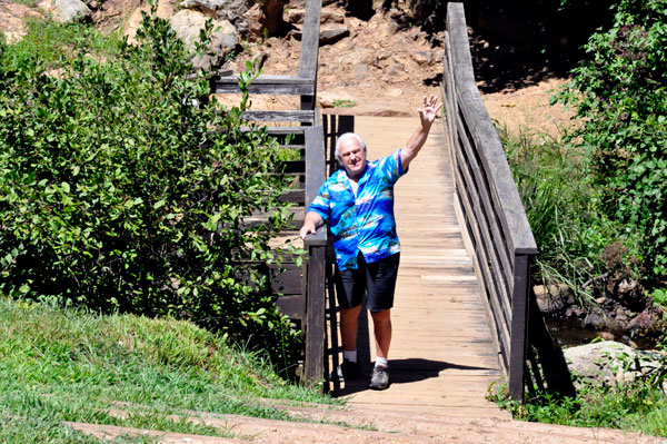 Lee Duquette on the bridge below the dam