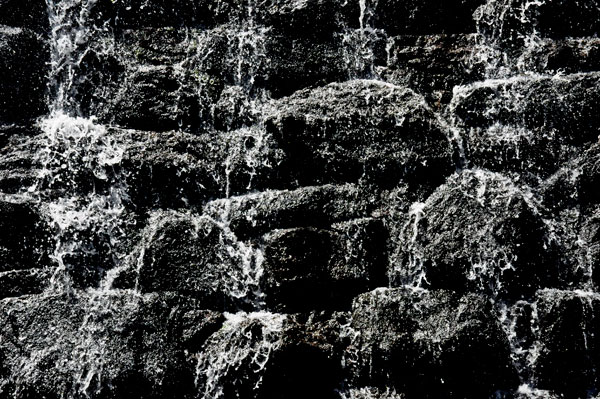 water flowing down the dam