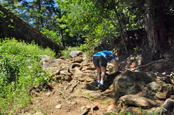 Lee Duquette struggling with the climb up the hill