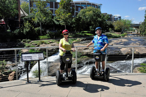 The two RV Gypsies on Segways at Falls Park on the Reedy