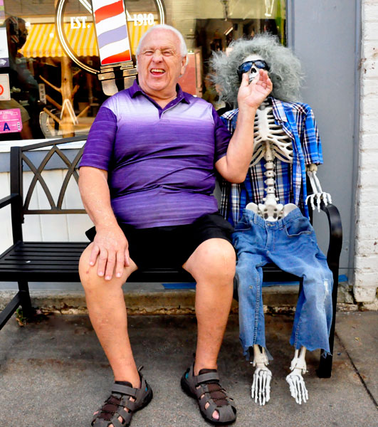 Lee Duquette and a skeleten scarecrow