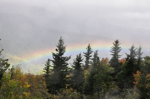 rainbow far below in the valley