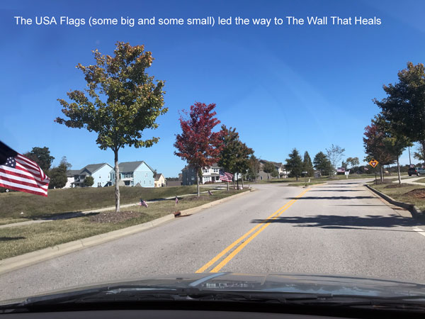 USA Flags along the road leading to The Wall That Heals