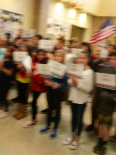 children welcoming the Veterans