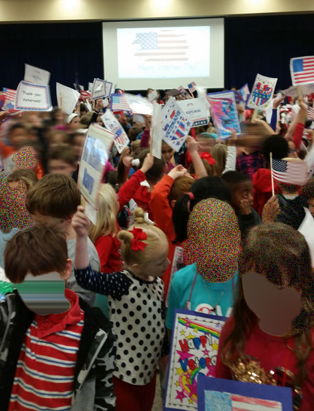 children welcoming the Veterans