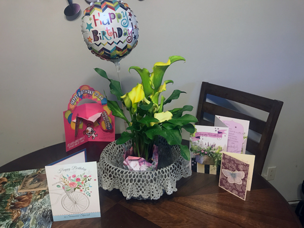birthday balloon and flowers
