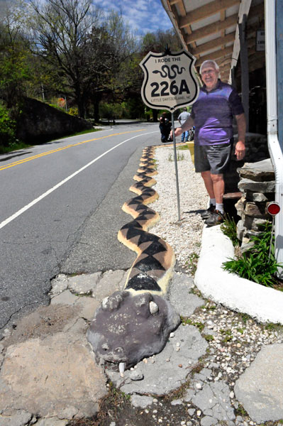 Lee Duquette with the snake road 226a sign