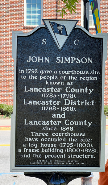 sign about John Simpson