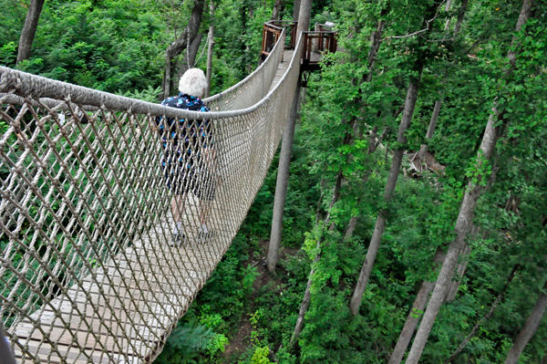 Lee Duquette on a swinging bridge