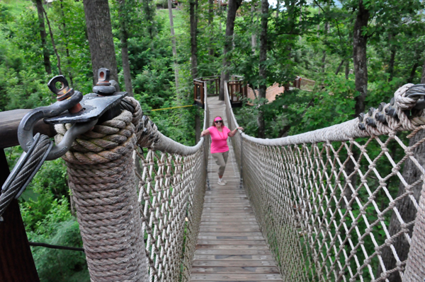 Karen Duquette on a seingingg bridge