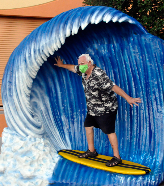 A masked surfer